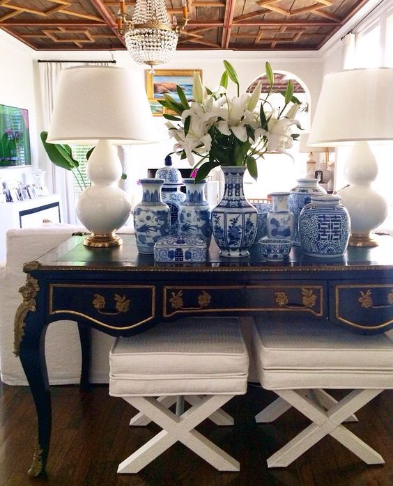 Living Room Decorating Ideas. Sofa console table filled with blue and white porcelain ginger jars. Palm Beach Style.