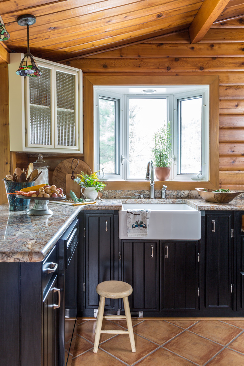 06_Farmhouse-sink-and-black-cabinets.jpg