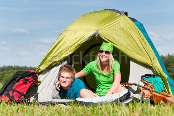 1050642_stock-photo-camping-couple-lying-inside-tent-summer-countryside.jpg
