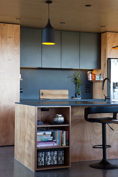 Box™ | KITCHEN | Gaboon ply with Black melamine cupboards and a Hoop Pine ceiling.