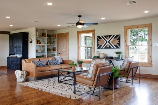 Wood Floors and Graphic Carpet Add Brightness to Living Room