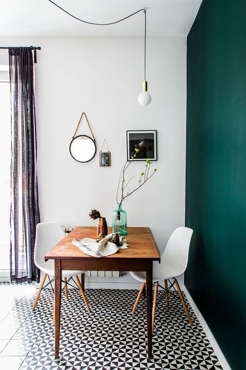Small dining area with bright colorful wall | #connox #beunique