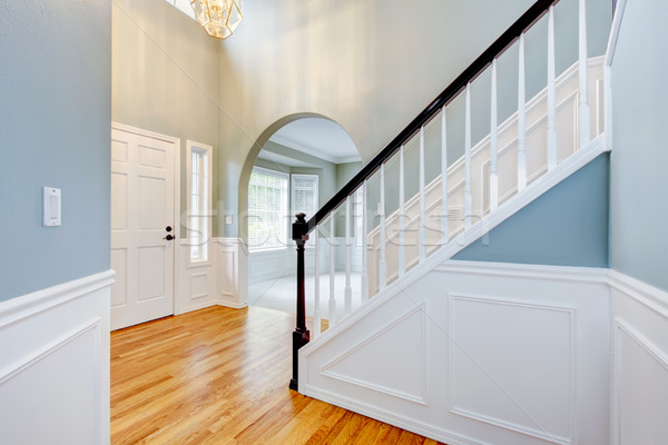 2254518_stock-photo-blue-empty-entrace-with-white-molding-and-staircase.jpg