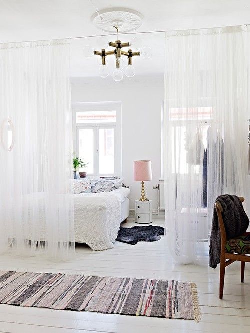 Love the idea of sheer curtains as room divider-studio  apartment or making 1 bdrm into 2 would also be cool if u divide a dorm room in half with a curtain like the one in the picture for privacy APARTMENT OR: