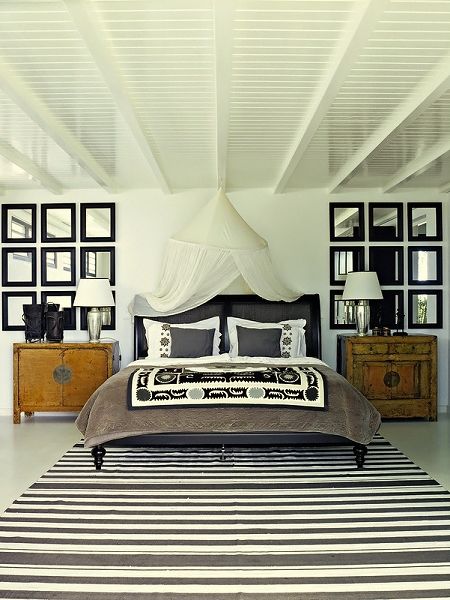 #Customframed mirrors on either side of the bed make this #bedroom appear larger!  Great #symmetrical look!