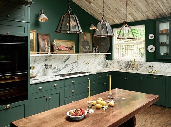 See why green kitchen cabinets are having a moment right now. Browse stunning spaces that utilize the hue and get paint ideas for your own kitchen.