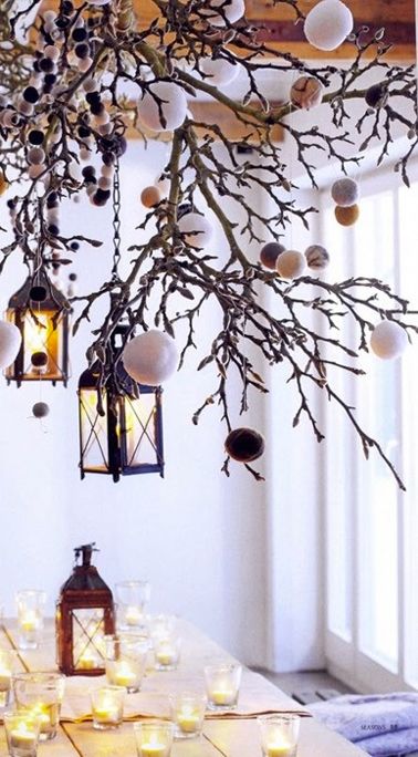 Branches with lanterns and pompoms