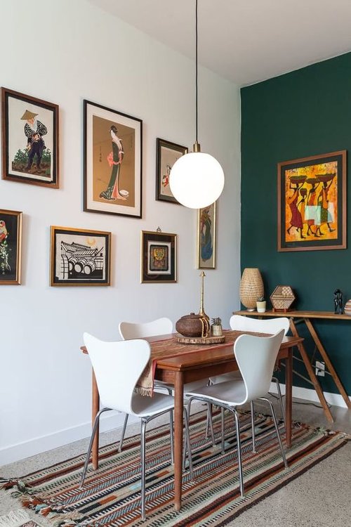Dining table with green wall