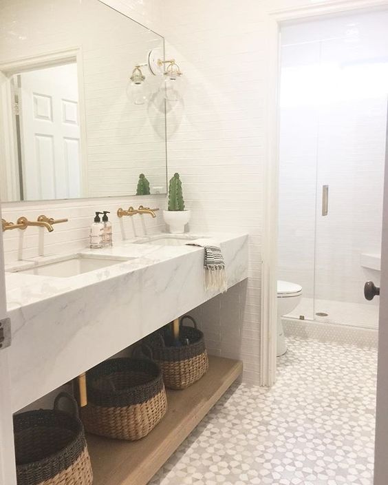 A shot from our #arbolesproject girls bathroom!  Custom marble vanity and marble mosaic tiles by @newravenna.  Also this weeks favorites on Beckiowens.com.