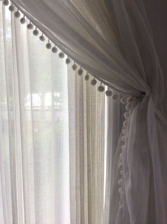 Muslin curtain with Pom Pom edge
