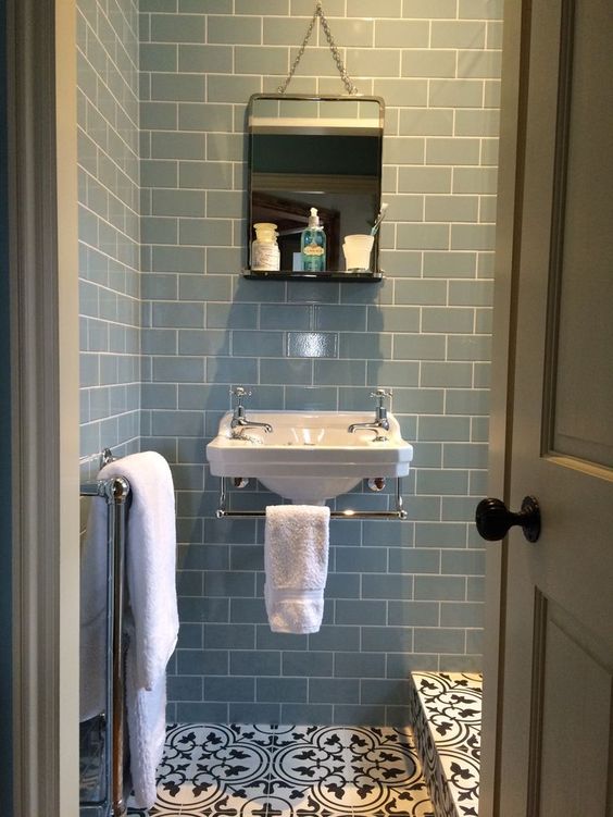 Bedroom 2 - Ensuite Shower Room. Burlington Edwardian Cloakroom basin, M&S vintage style hanging mirror, Fired Earth Pont Neuf encaustic floor tiles & Retro Metro Atrium blue crackle glaze wall tiles. Carron Bassingham towel radiator.