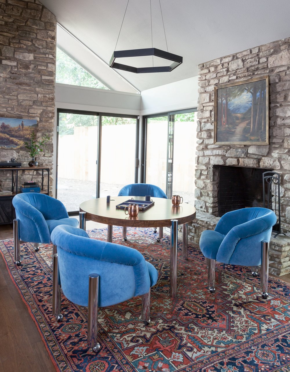 ERIN WILLIAMSON | OKENA GAME TABLE BLUE VELVET CHAIRS RESIDENT LIGHTING HERIZ RUG