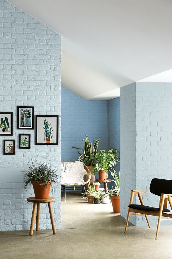 Wonder how a white brick wall would look like in the living room? Check this lovely list! There is something about brick walls that I really like. No matter what kind of space it is, I like to see a brick wall no matter how small that area is. I just like the texture and the natural feel that it brings into the interior of the home.  #WhiteBrickWall #WhiteBrickWallLivingRoom #WhiteBrickWallIdeas