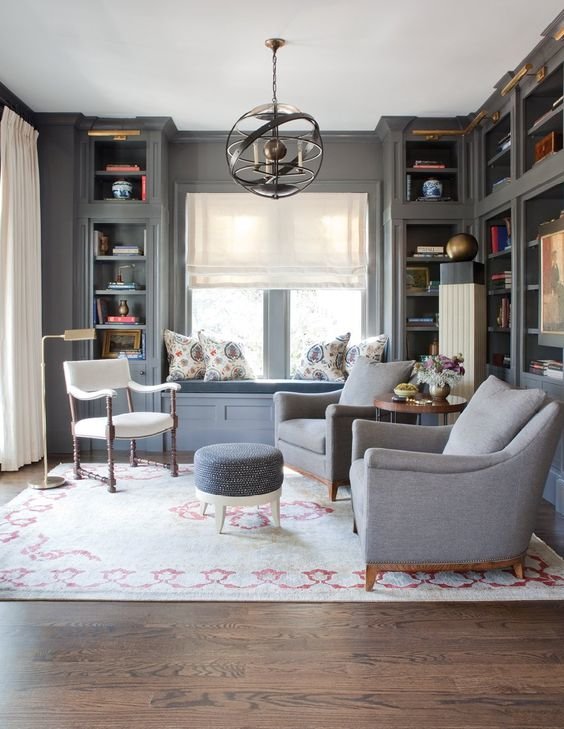 Kendall Charcoal - Benjamin Moore  “The dark color really envelops you and feels cozy,” says interior designer Nina Nash. When she and her Mathews Furniture partner Don Easterling created this sultry and sophisticated study in Ansley Park, they installed classic built-ins, then furnished the room in rich tones from both ends of the color spectrum