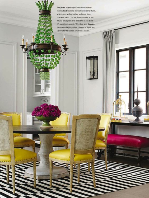 Love these yellow chairs and bold green chandelier.