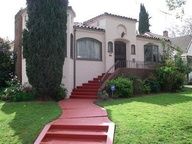 Love the red walkway leading up to this home!